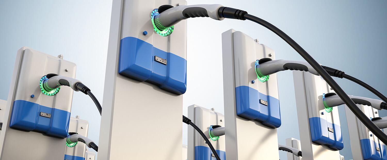 A row of white and blue EV charging ports